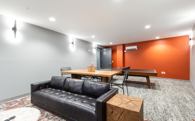 Room with games, tv and a couch