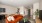 Styled apartment with bright orange couch